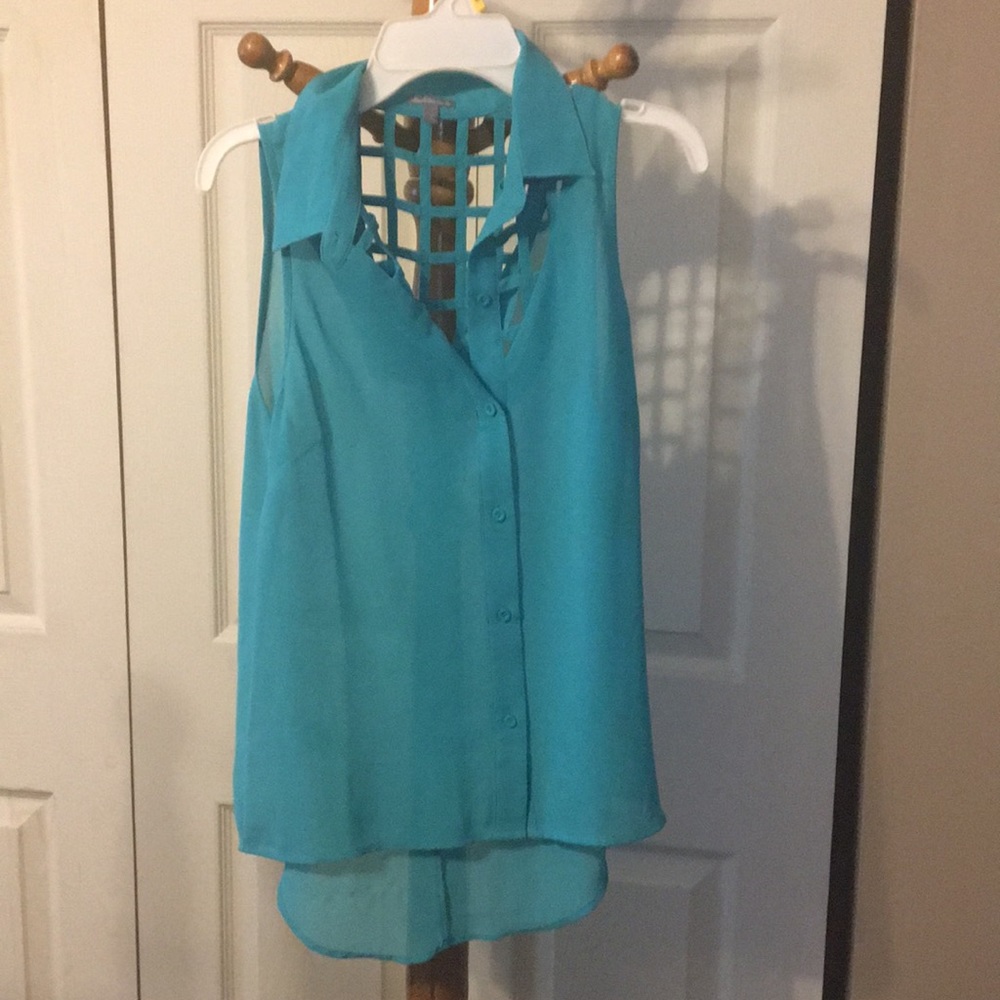 Turquoise sleeveless blouse